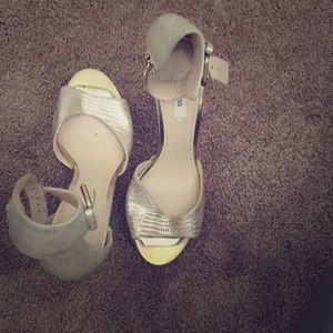 Gold Guess stilettos